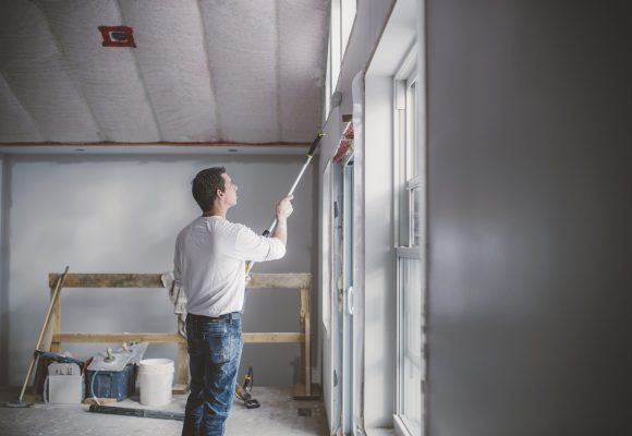 Painter decorator working inside building